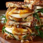 pear and apple grilled cheese with caramelized onions First Image